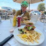 sitting down to a burger and fries