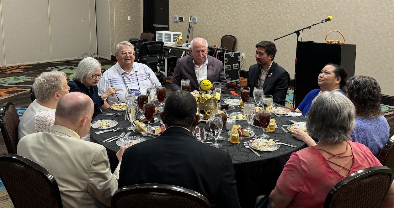 Picture of the head table with Tom Love, Lawton Mayor Stan Booker, Daniel Pae, Dana Young, Vicki Golightly, Frances Pointdexter, Michael Garrett, Jay Doudna, Elaine Boykin, Lawton Councilwoman Mary Ann Hankins