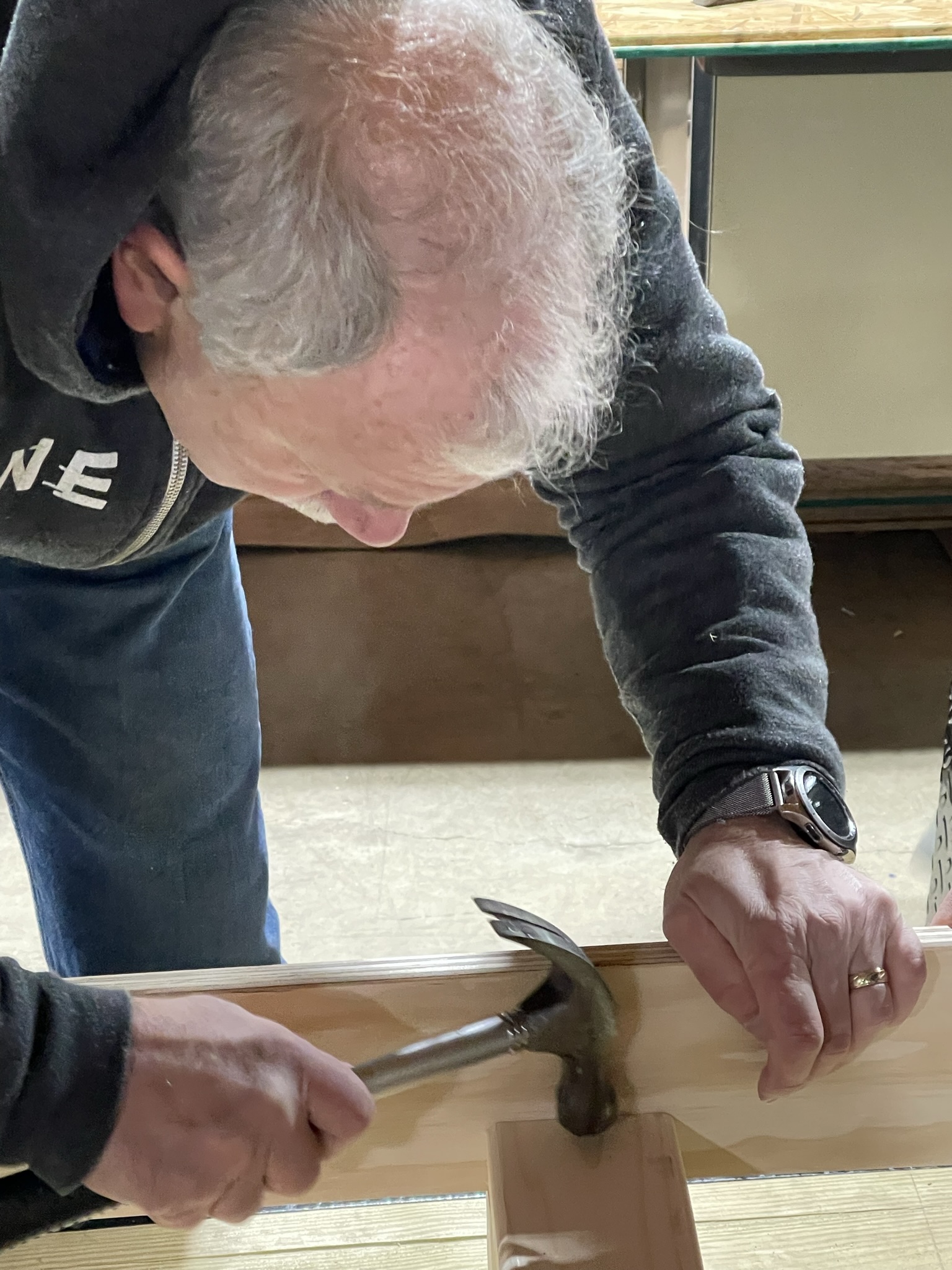 man using hammer