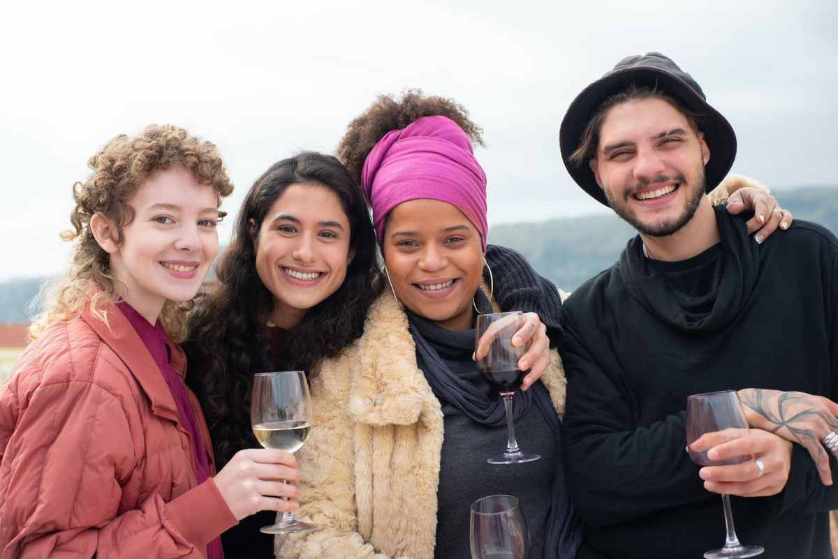 group of people drinking wine