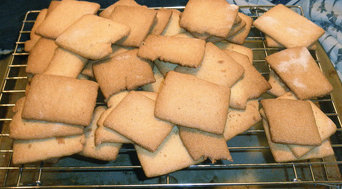 Freshly baked Sotterley Jumbles cooling on wire racks, golden butter cookies from classic Maryland cookbook recipe