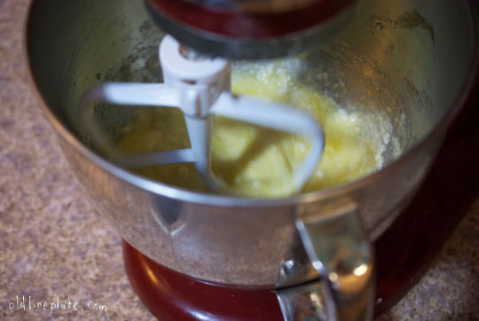 Potato dough being mixed in electric mixer bowl for Fastnachts Küchlie fried pastry recipe