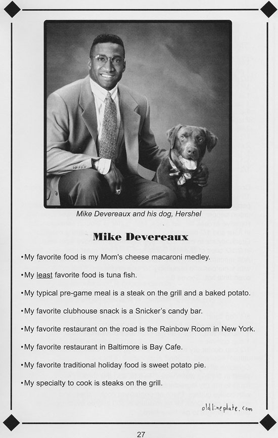 Mike Devereaux and his dog Hershel posing for a black and white portrait photo from a vintage sports cookbook page