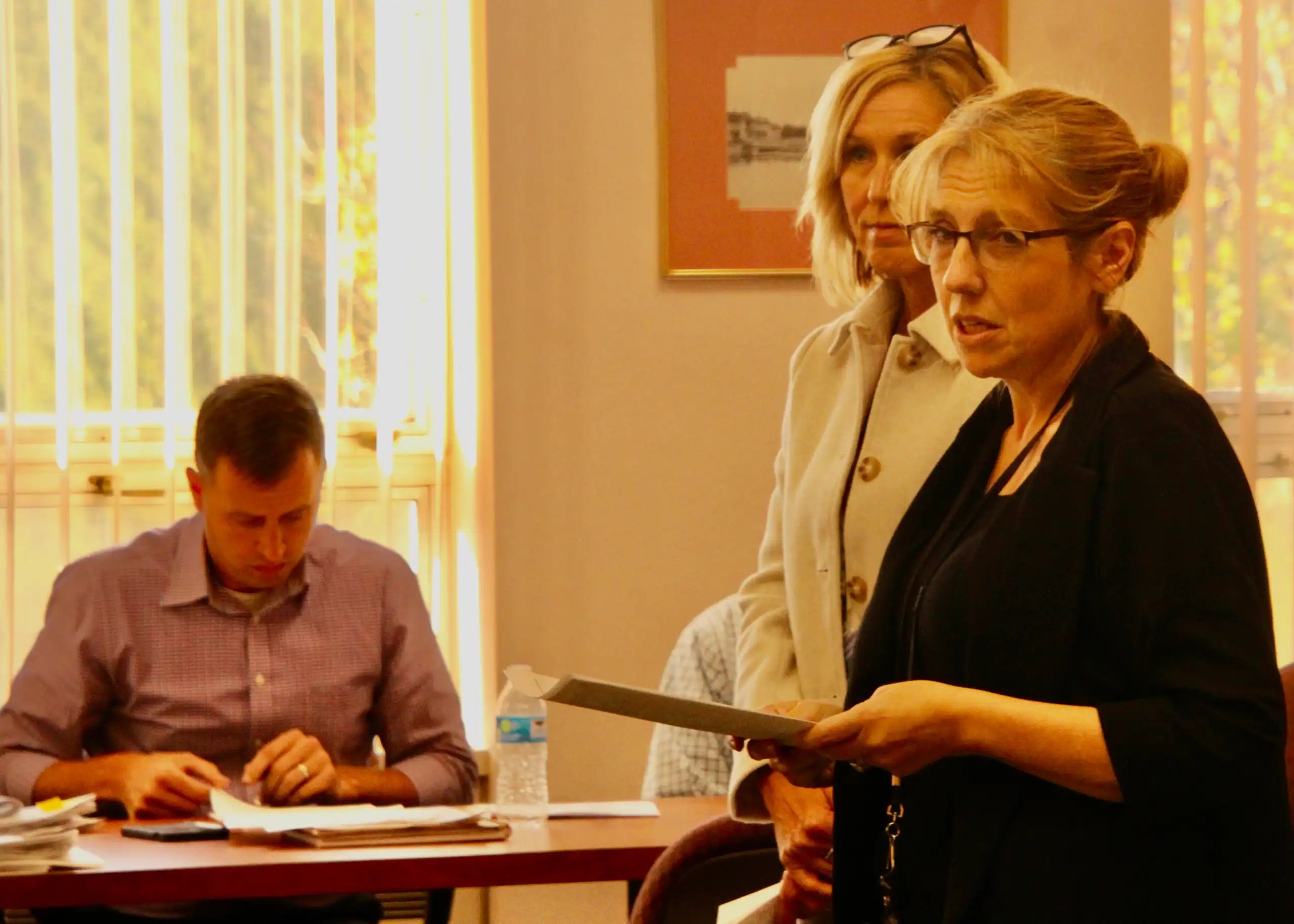 (Rick Miller/Olean Star) Cattaraugus County Admnistrator Kelly Reed (right) brieas county lawmakers Wednesday on proposed changes in county retirees' health insurance benefits. Standing next to her is Human Resources director Kristine Phinney
