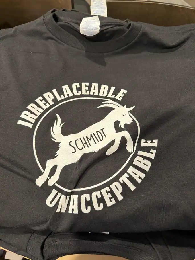 Fans are handing out T-Shirts ahead of the Davidson game honoring Schmidt as the GOAT.