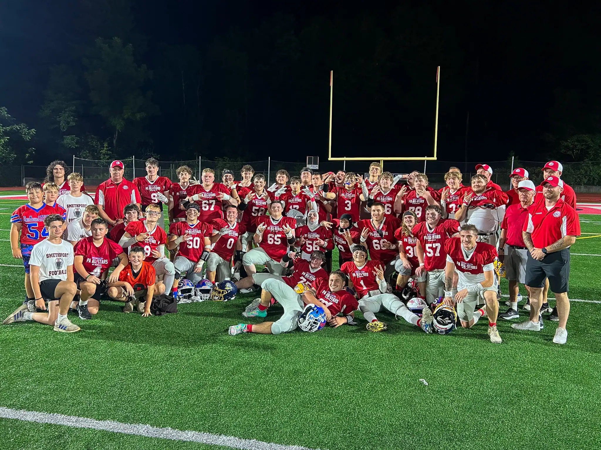Team Pennsylvania celebrates together after beating New York in the 53rd annual Big 30 All-Star Charities Classic. | Photo by Hunter O. Lyle