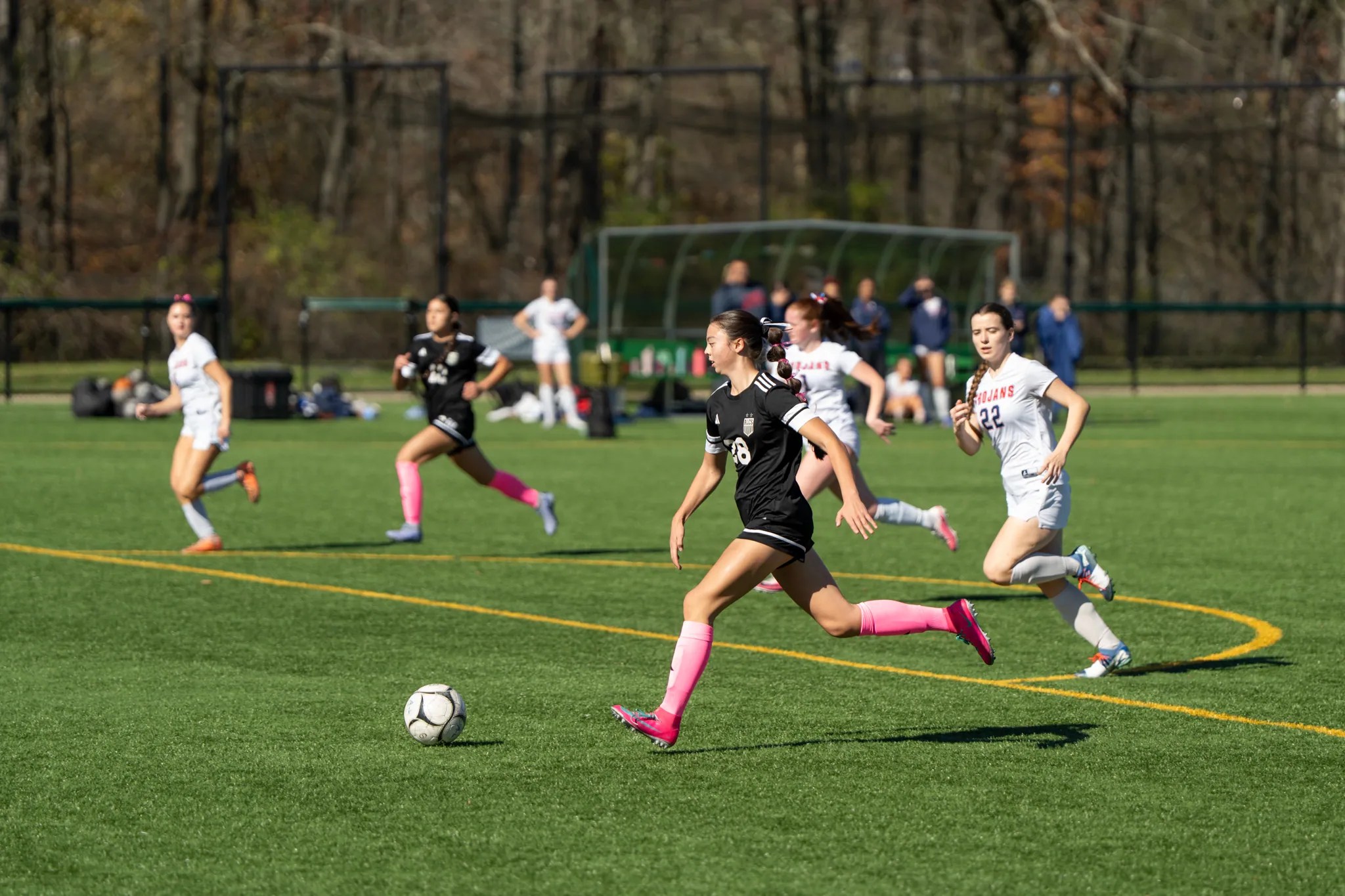Kai Wojewoda-Ko streaks past the defense during the Gators' quarterfinal win over Southwestern. Shouldering the offensive weight, Wojewoda-Ko scored her 13th and 14th goal of the season. | Photo by Hunter O. Lyle
