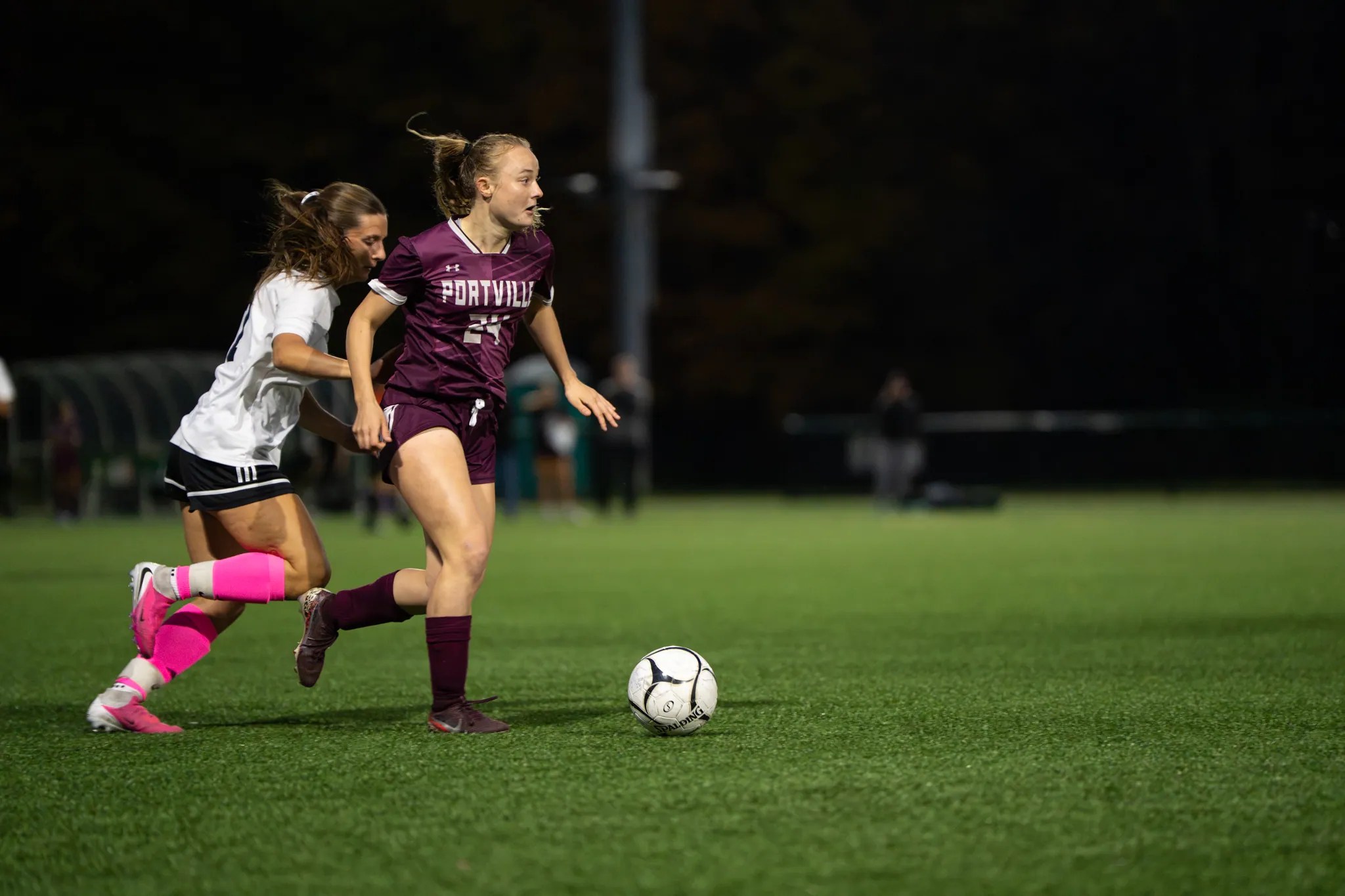 Portville's Grace Gariepy out-paces an Allegany-Limestone defender during the Panthers' win in their regular season finale. | Photo by Hunter O. Lyle