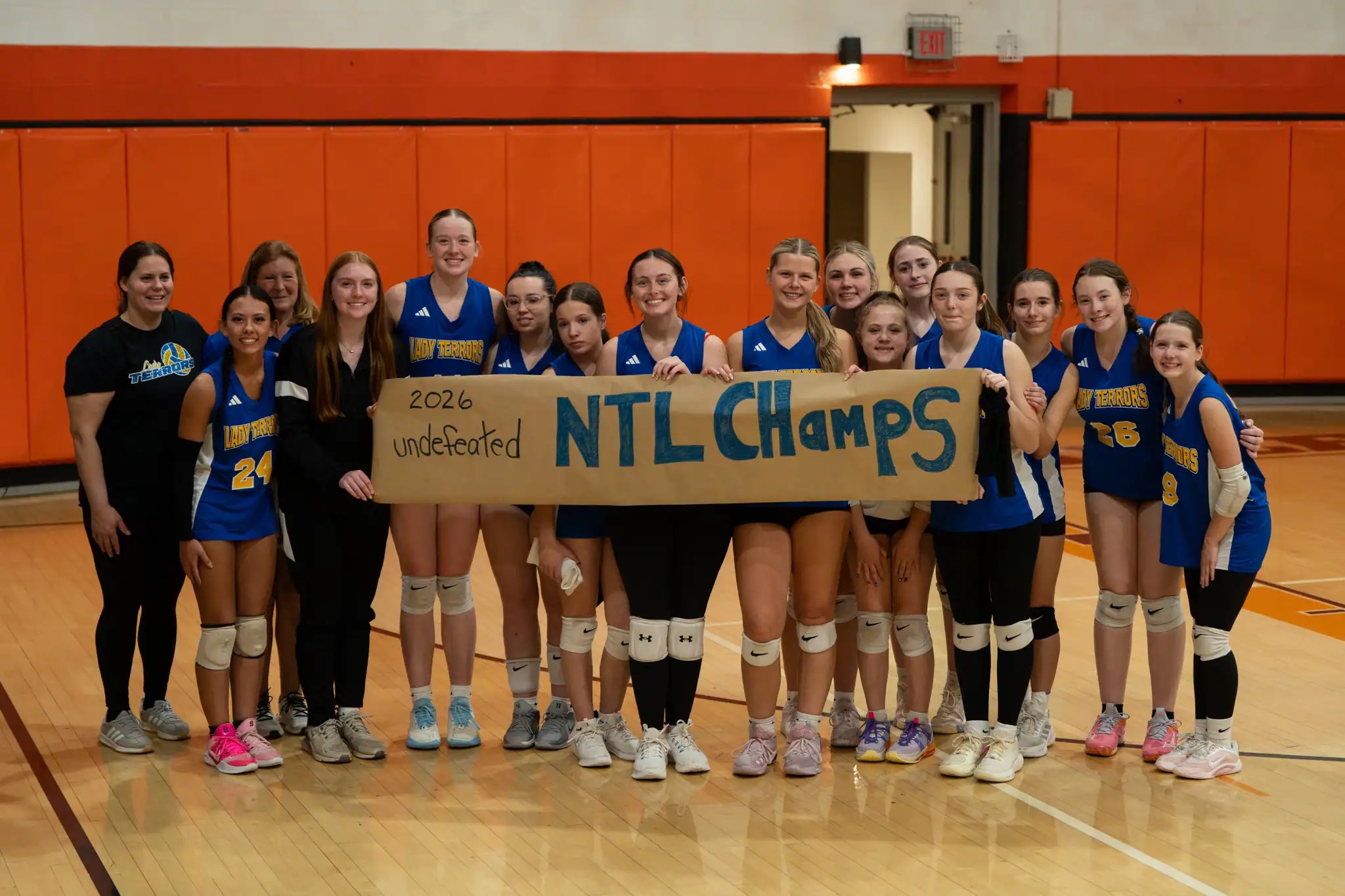 The Otto-Eldred volleyball team poses after completing an undefeated regular season with their finale win against Port Allegany. | Photo by Hunter O. Lyle