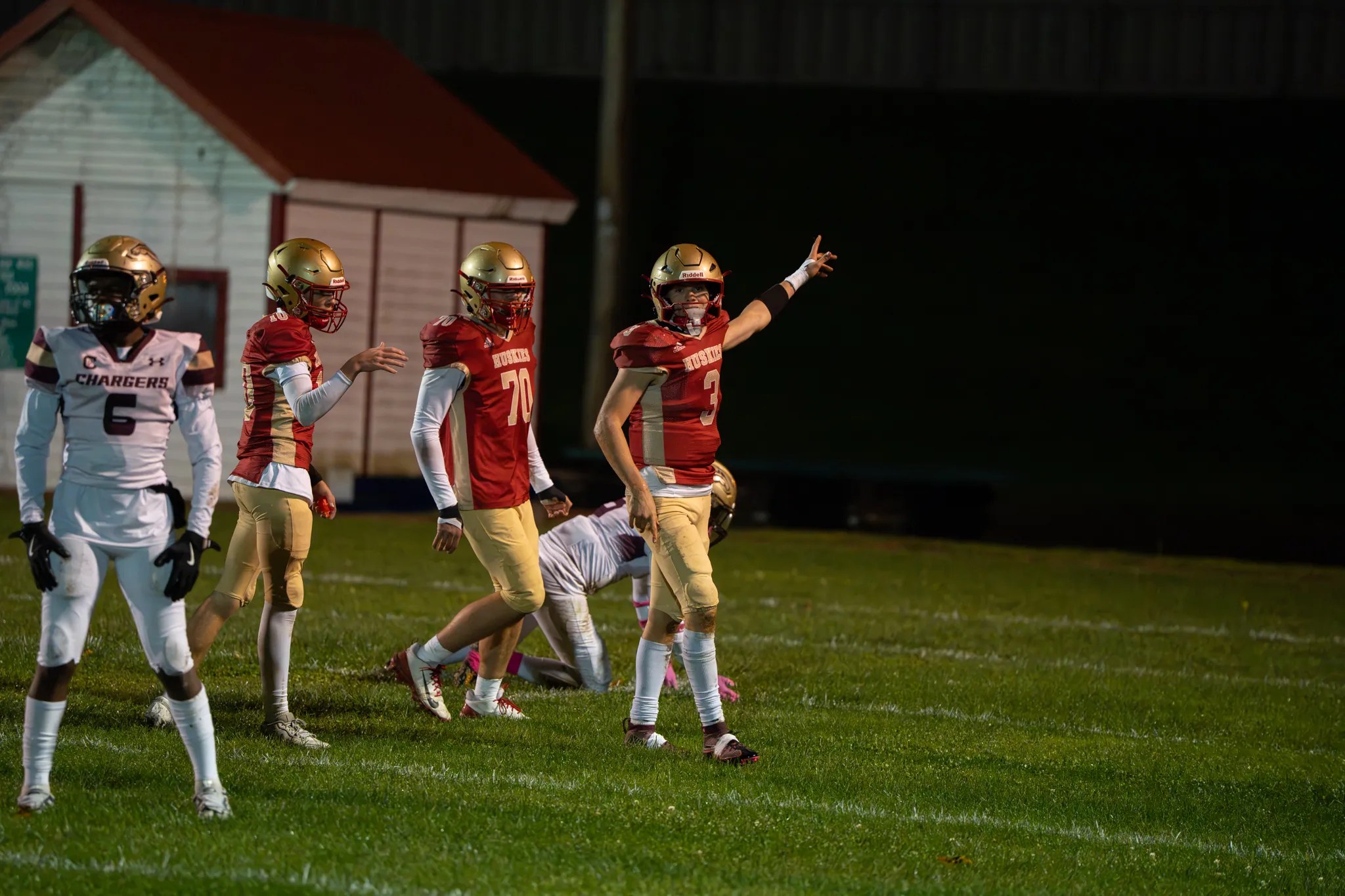 Dom Myers and the Huskies celebrate after a big gain during their win over Cheektowaga. In the past two weeks, Olean's offense has combined for 84 points. | Photo by Hunter O. Lyle