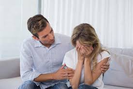 A Man Consoling a Crying Woman
