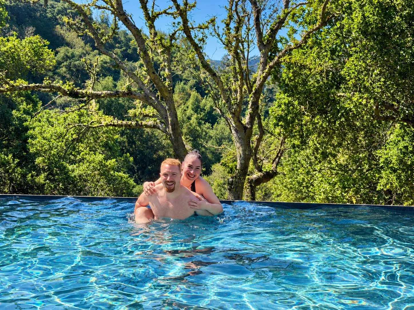 Olivia Gallucci and James in a pool