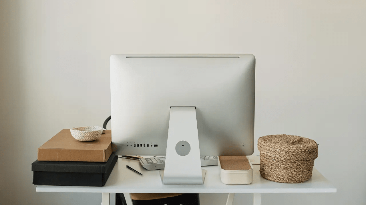 A monitor on a clinician's desk, with blog post open covering the best SEO Tools for Weight-Inclusive Private Practices