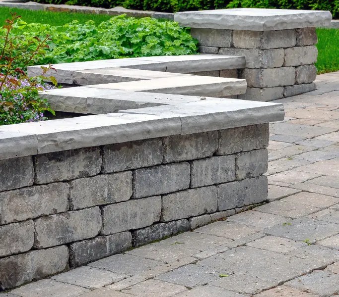 retaining wall built with pavers block belgard