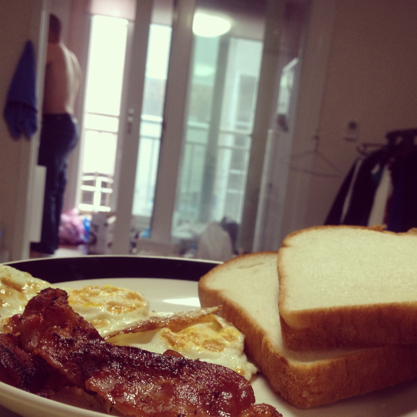 Clint cooking me breakfast.