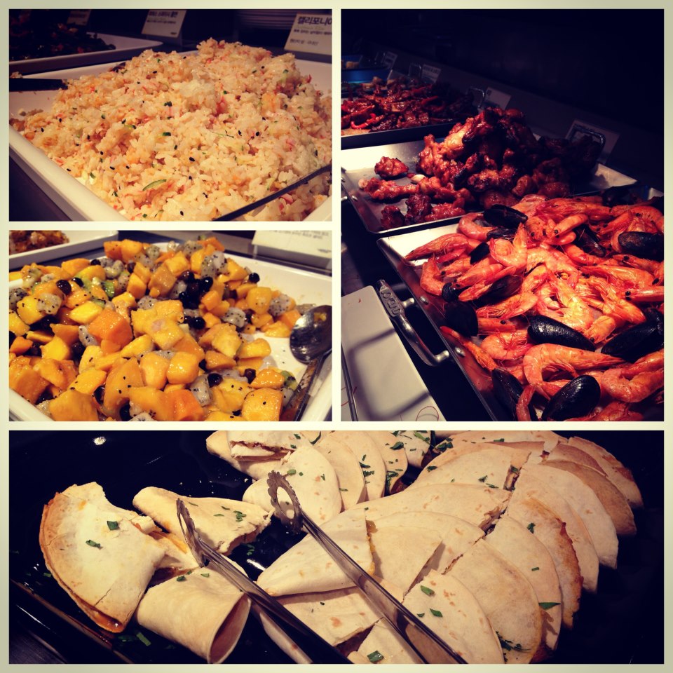 Fried rice, wings, fruit salad, and quesadillas