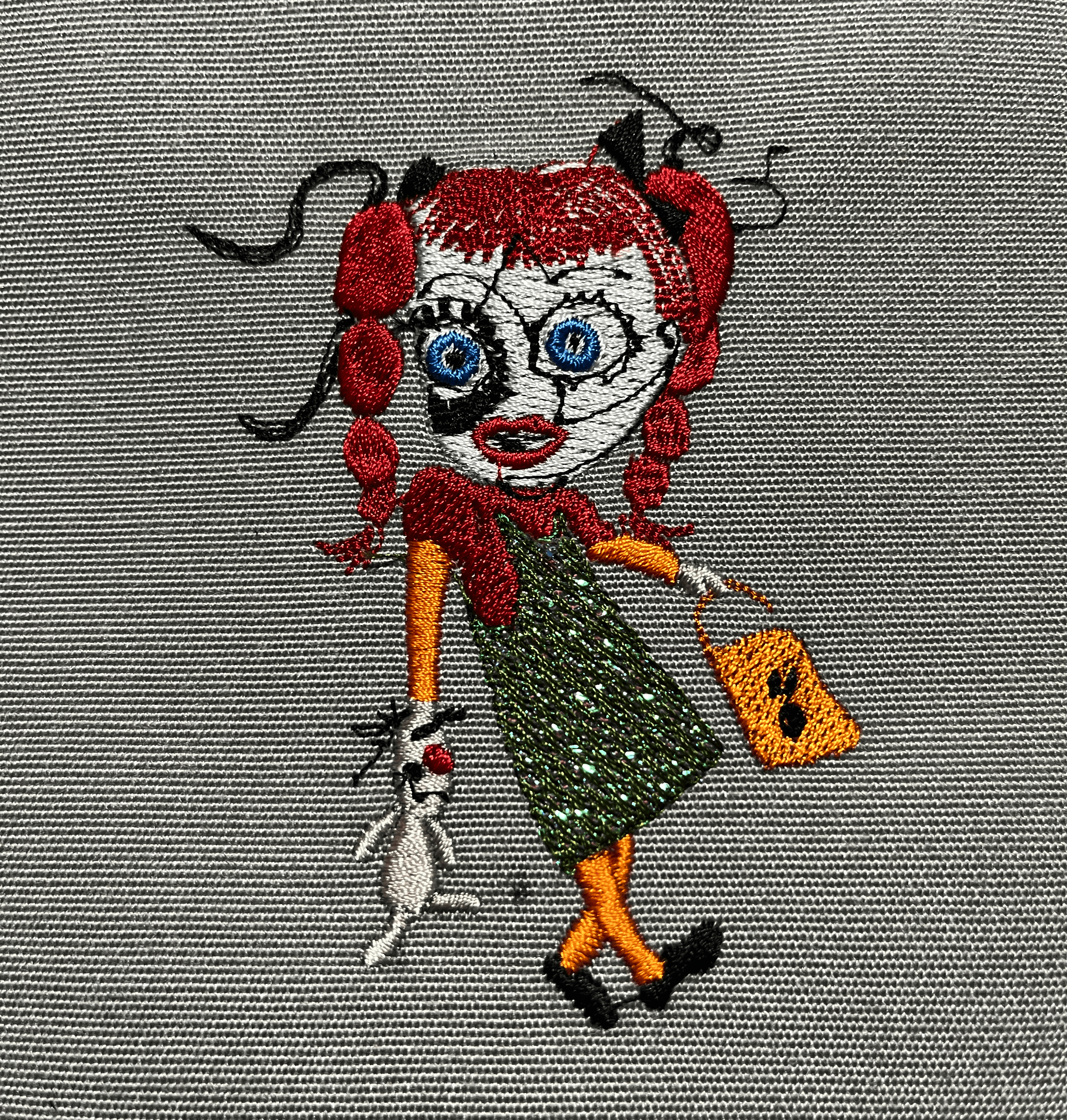 OML EmbroideryLearn.Stitch.Smile. Trick o Treat Patchwork Doll Mylar Design