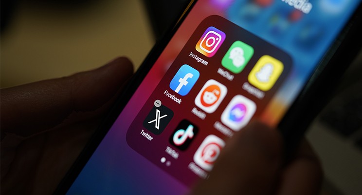 phone screen with social media icons