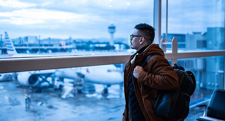 man at airport terminal