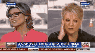 Two reporters who are pretending they aren't right next to one another.