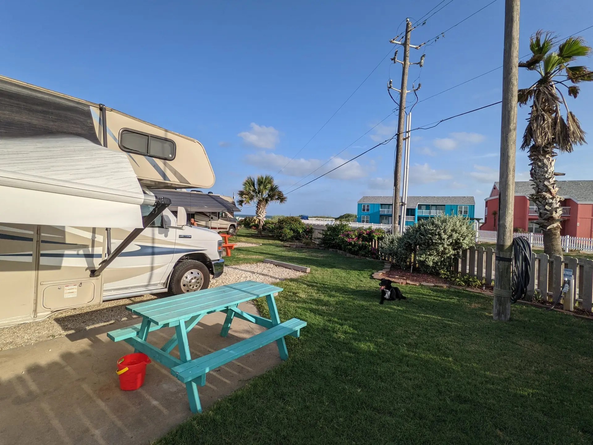 Beachfront RV sites at On The Beach Rv Park with picknick table, dog and rv