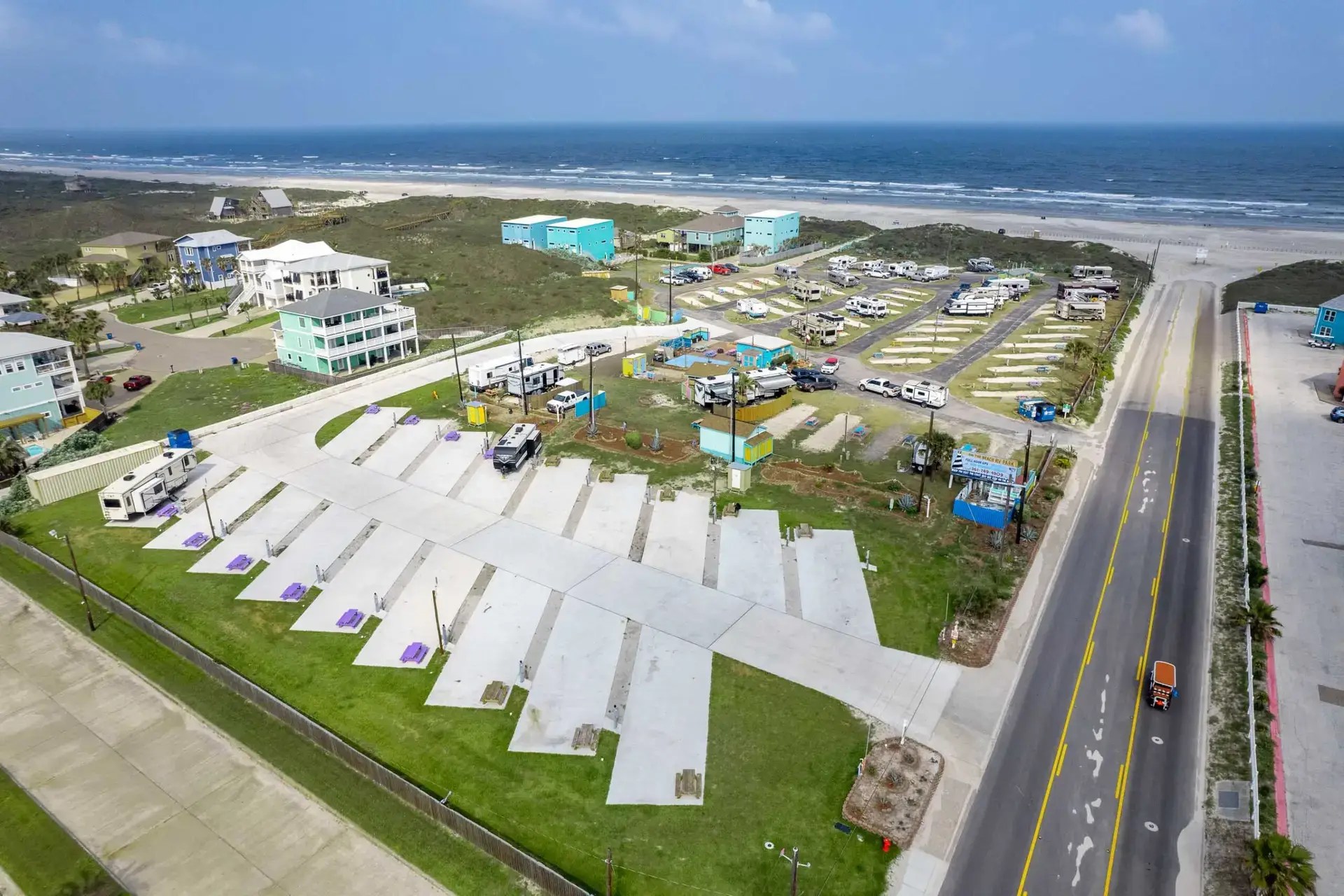 Aerial of on the beach rv park with beach and ocean in background