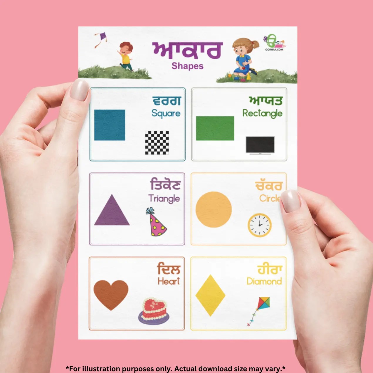 Both hands is holding a chart of shapes and their names in Punjabi and English front of the pink wall.