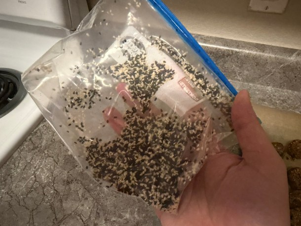 Shaking the bag.