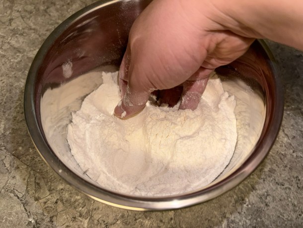 Blending together dry ingredients.