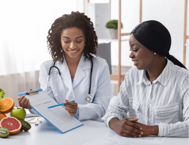 doctor explaining something on her patient