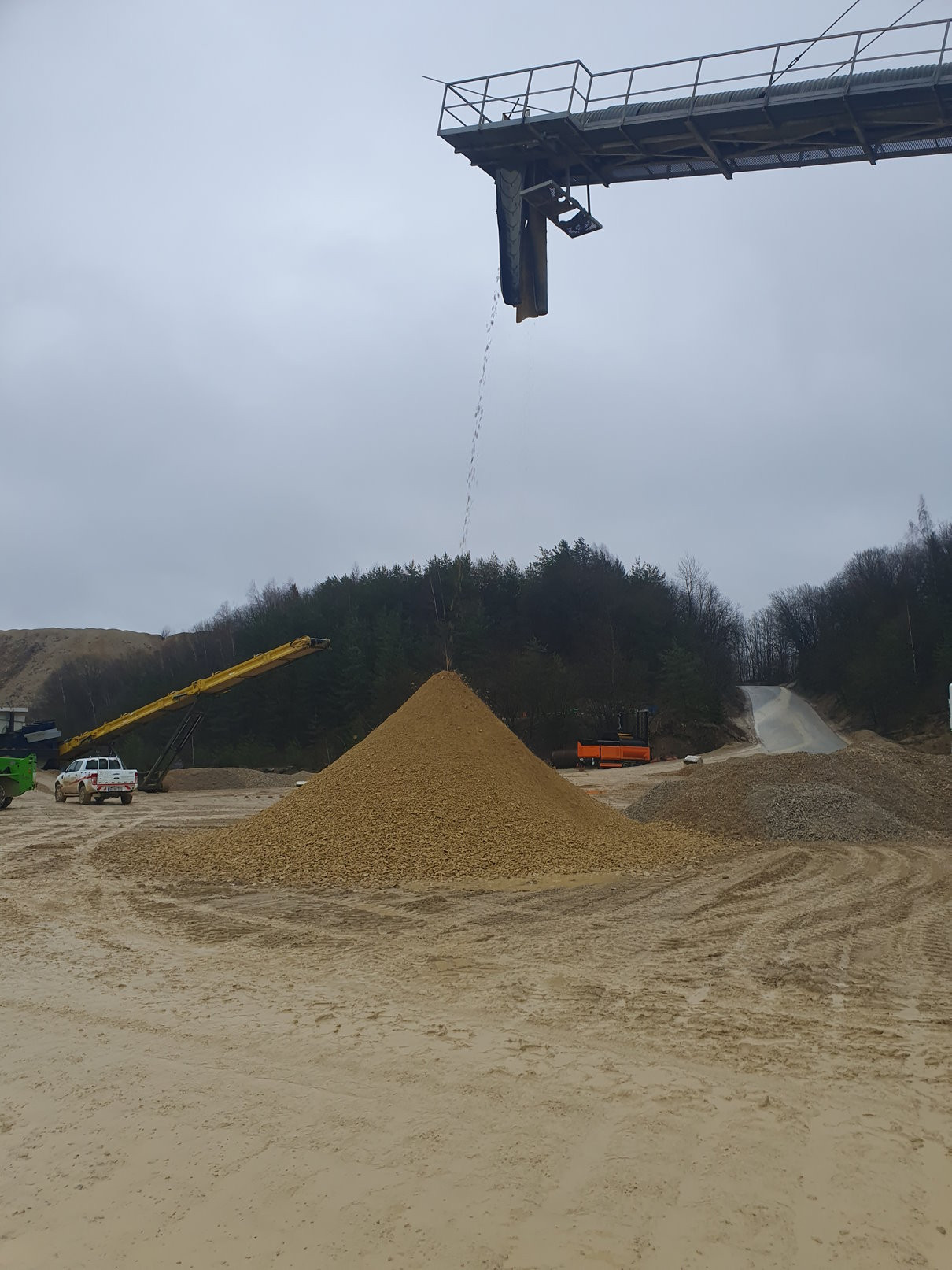 ore sorting layout with conveyor, stock pile and waste ore pile