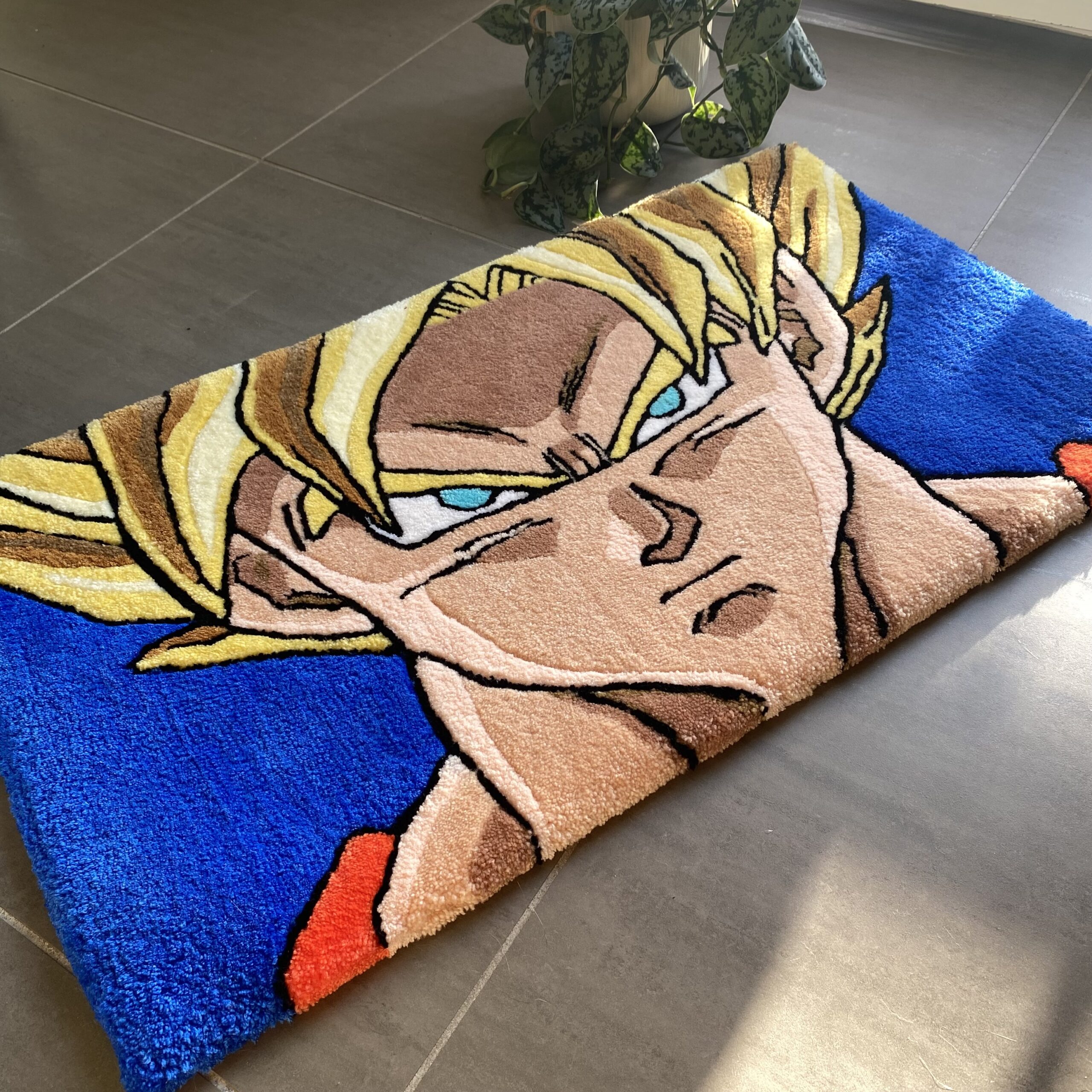 Tapis en laine Dragon Ball Z, portrait intense de Goku en forme Super Saiyan