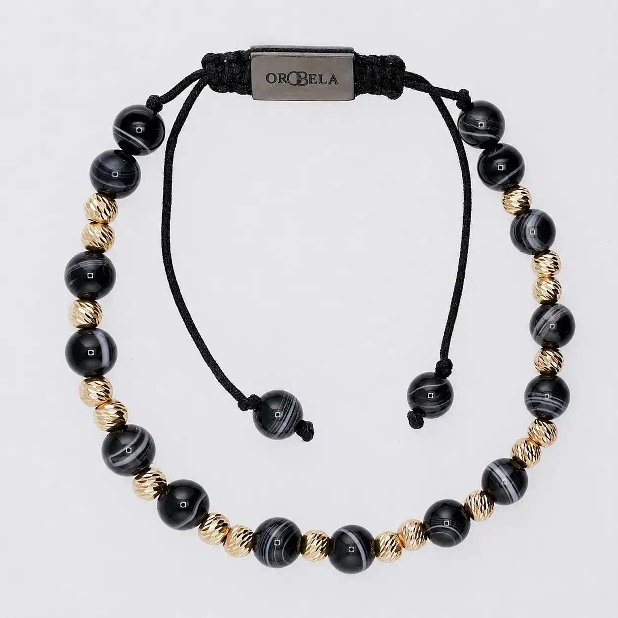Elegant black and gold beaded necklace with adjustable cord from OROBELA.