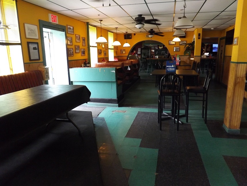 A well sized dining area in the front of the building allows customers to eat without walking through the bar area.