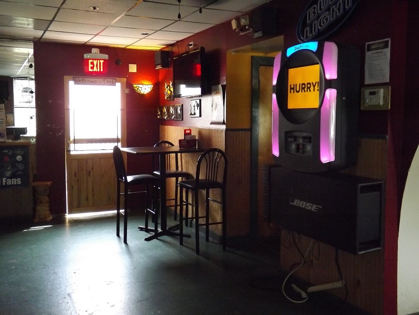 A juke box provides customers the opportunity to play music of their choice.