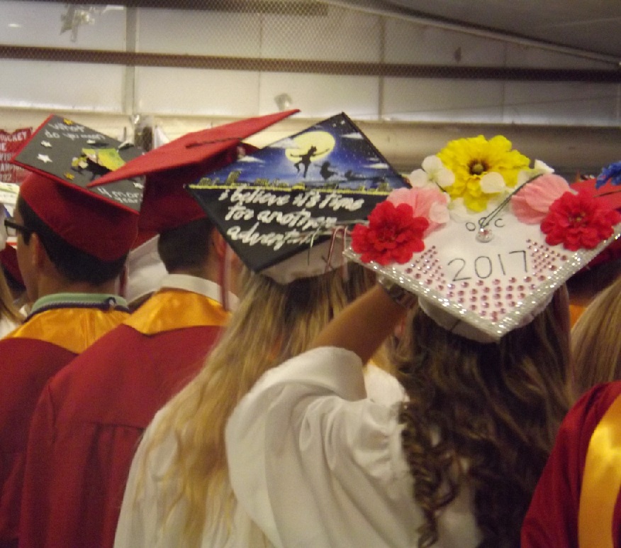 Students creatively decorate their caps.