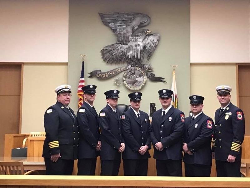 Chief David Eiffe and Assistant Chief Shane Laws stand with the five newest hires of the Fulton Fire Department. L to R: Asst. Chief Shane Laws, FF Henry Kellogg, FF Mark Gentile, FF Mark Joss, FF Nick Williams, FF Sean Baird, Chief David Eiffe.