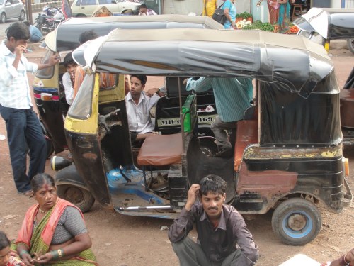 Figure 9. Photo I took of an auto-rickshaw while visiting India in October 2012. A total of 10 of us (including driver) traveled for several miles in a three-seated version of one of these. Those of us on the edges held on tightly to the frame, because there was not room for all of us.