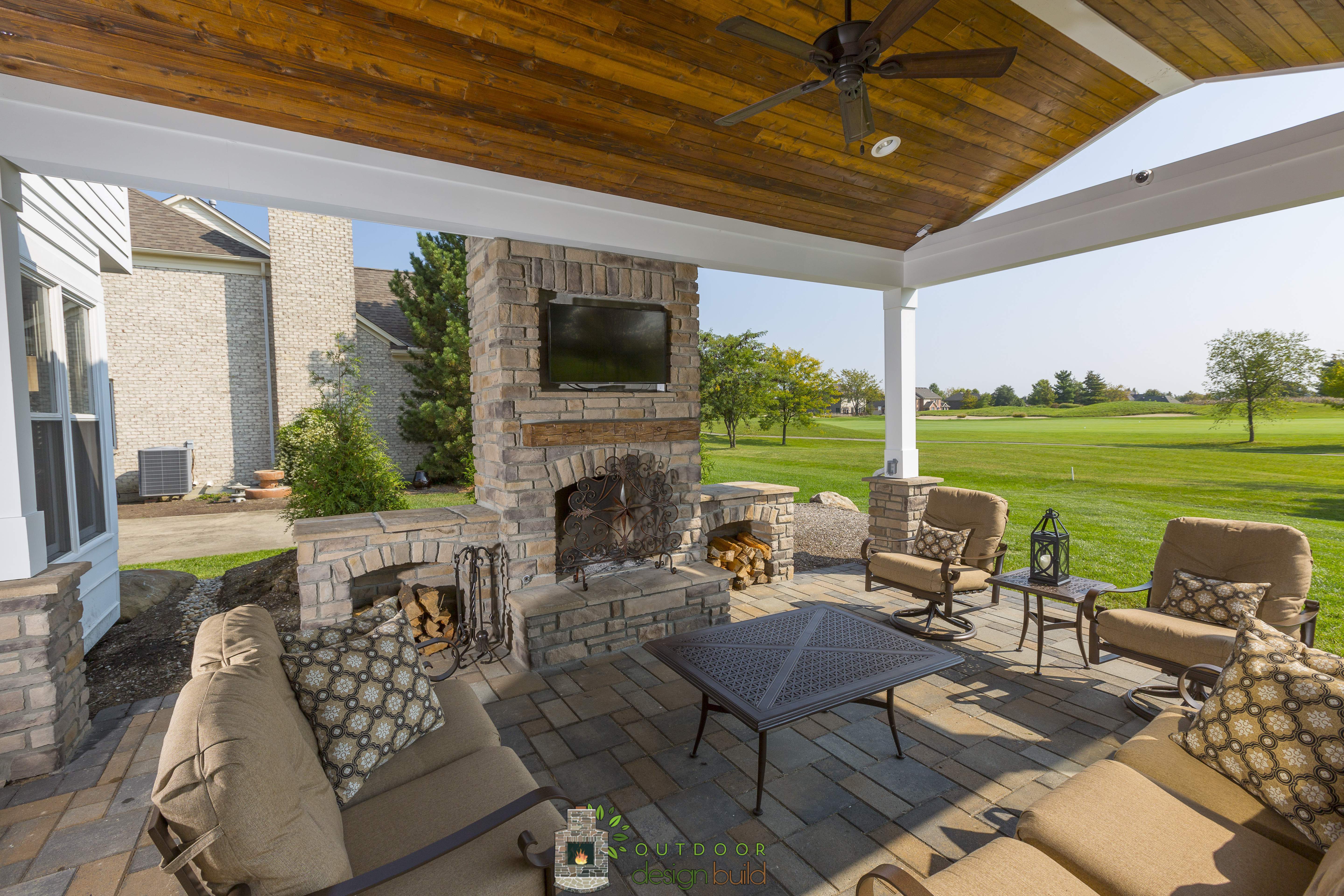 Sizzling Style How To Decorate A Stylish Outdoor Hangout With A Fireplace