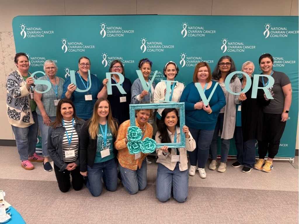 Ovarian cancer survivors celebrate live at a National Ovarian Cancer Coalition education event.