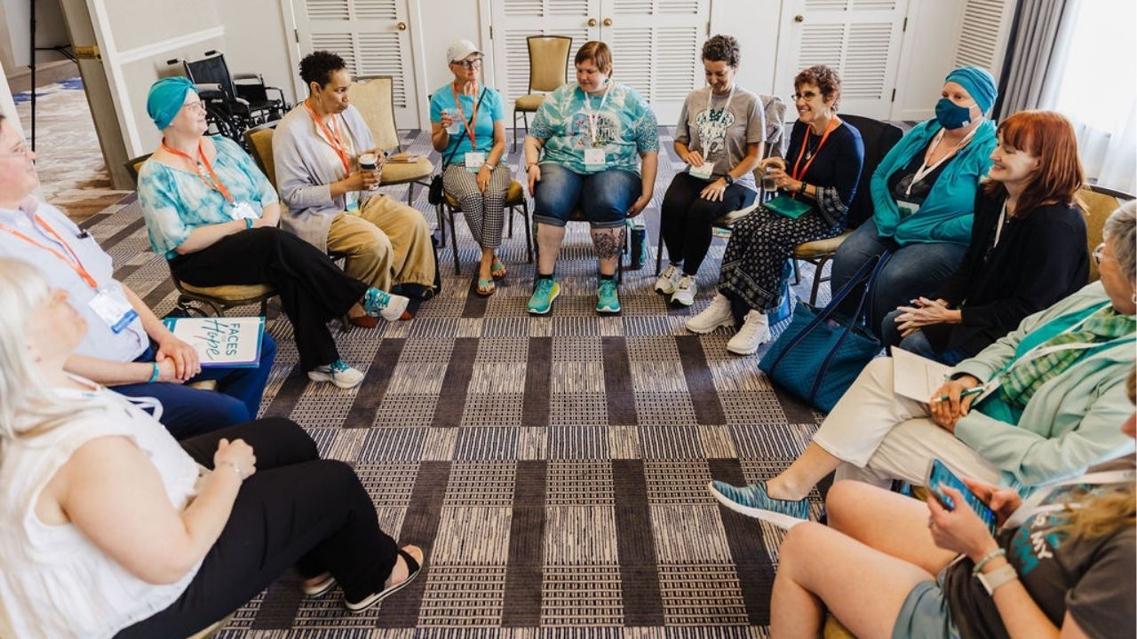 Group of ovarian cancer patients and survivors attending a peer support group session