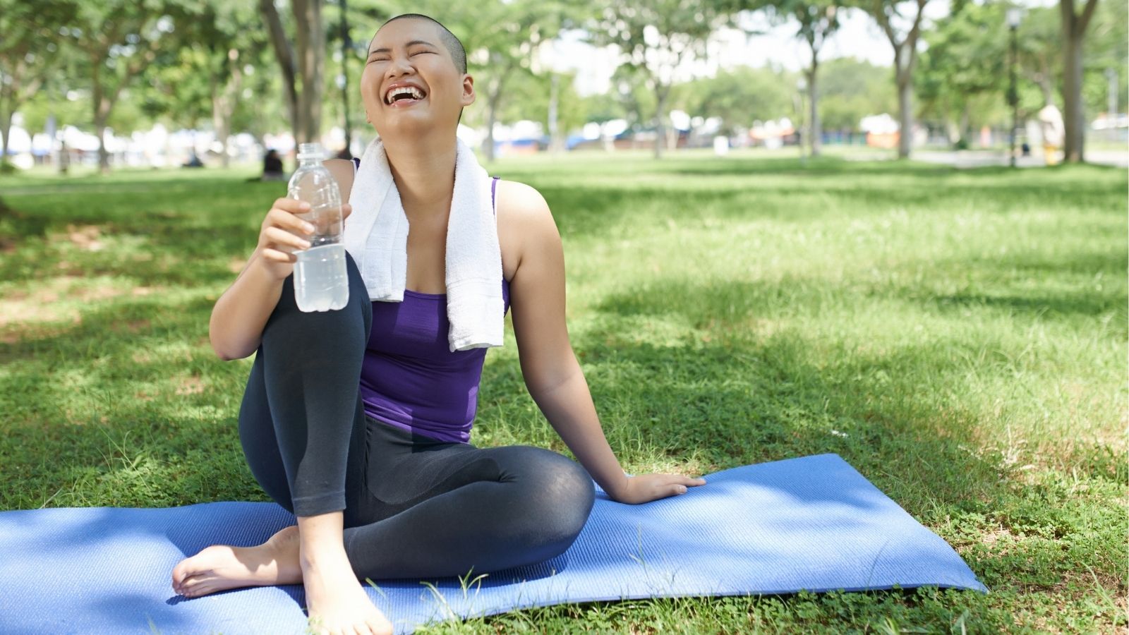 Ovarian cancer survivor enjoying a yoga session