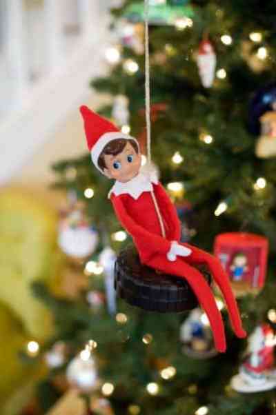 Elf Riding Tire Swing