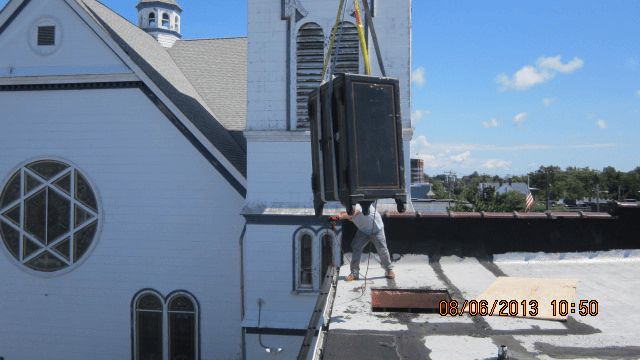 Challenging safe removal from room with use of a crane