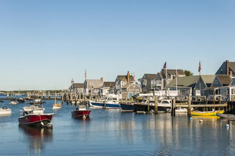 Scenic view of a harbor in Nantucket with boats and houses