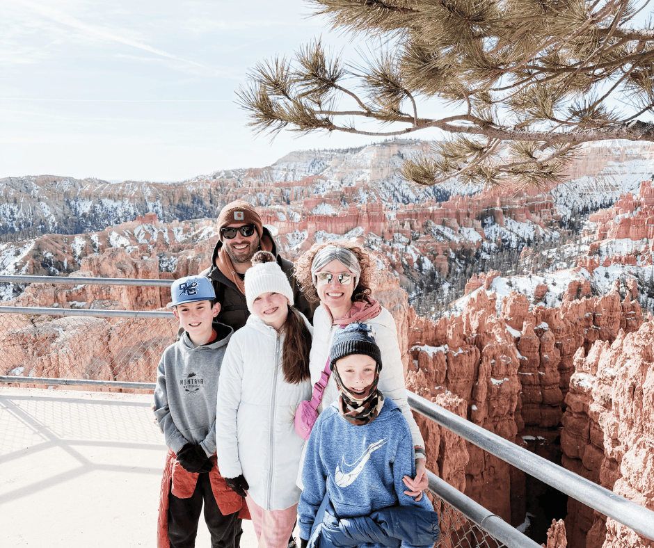 The Page family posing with Bryce Canyon behind them, featured by Page Creative as part of its travel storytelling highlighting family adventures, national parks and meaningful destination experiences.