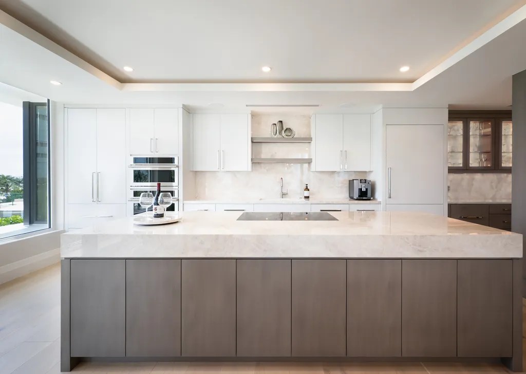 Luxury condo renovation featuring custom flooring, cabinetry, and modern finishes