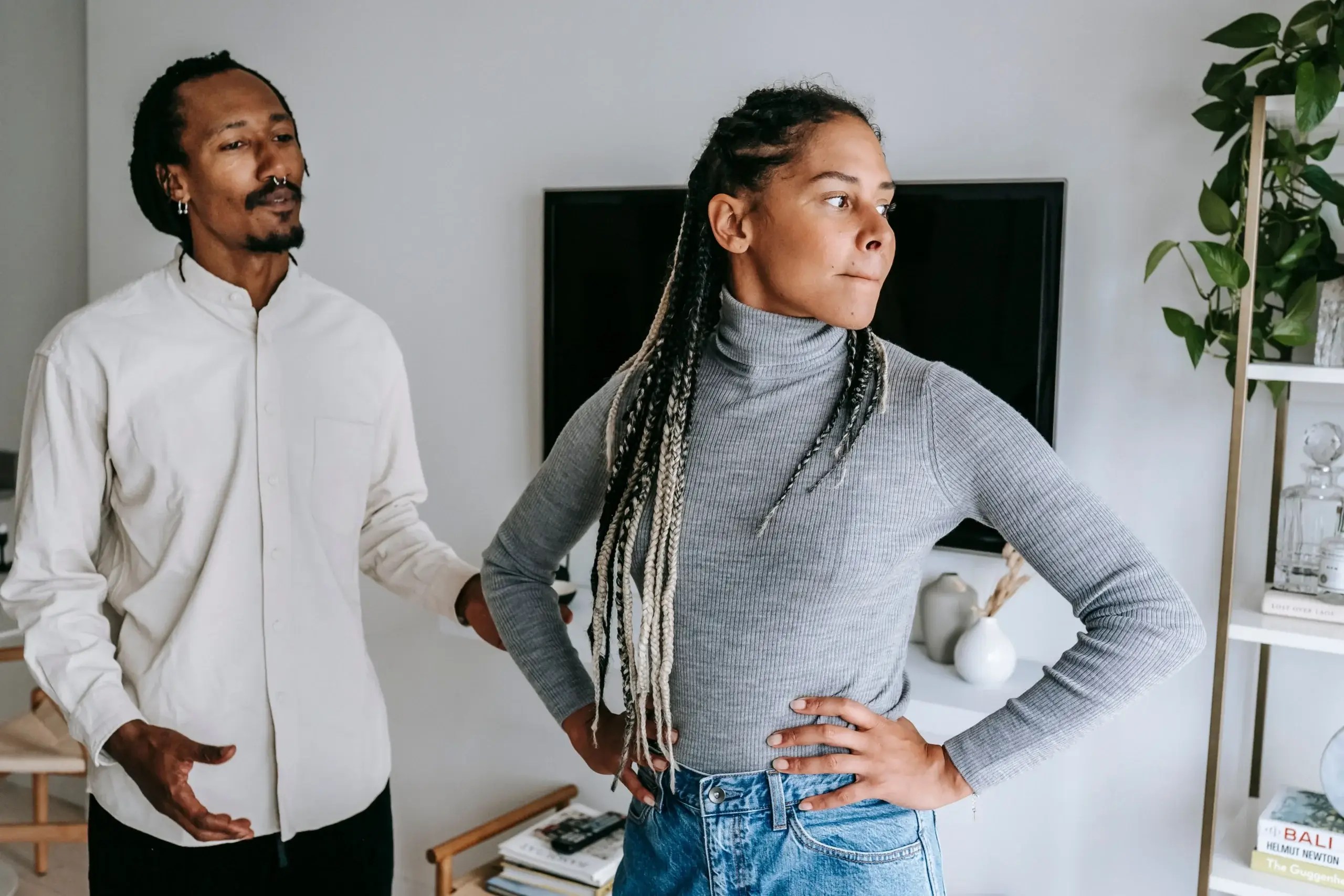 Couple navigating feelings of jealousy during a relationship conversation, highlighting emotional vulnerability and attachment.