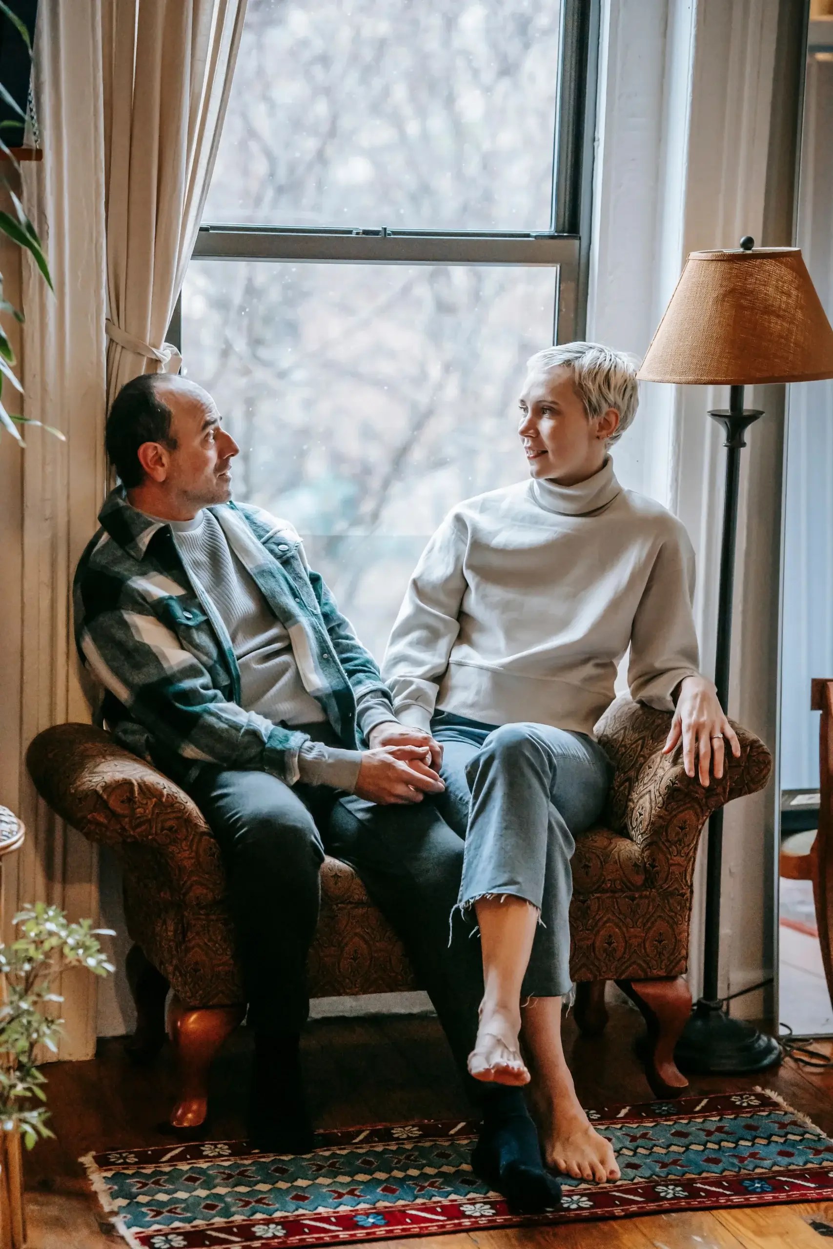 Couple sitting together and having an open conversation
