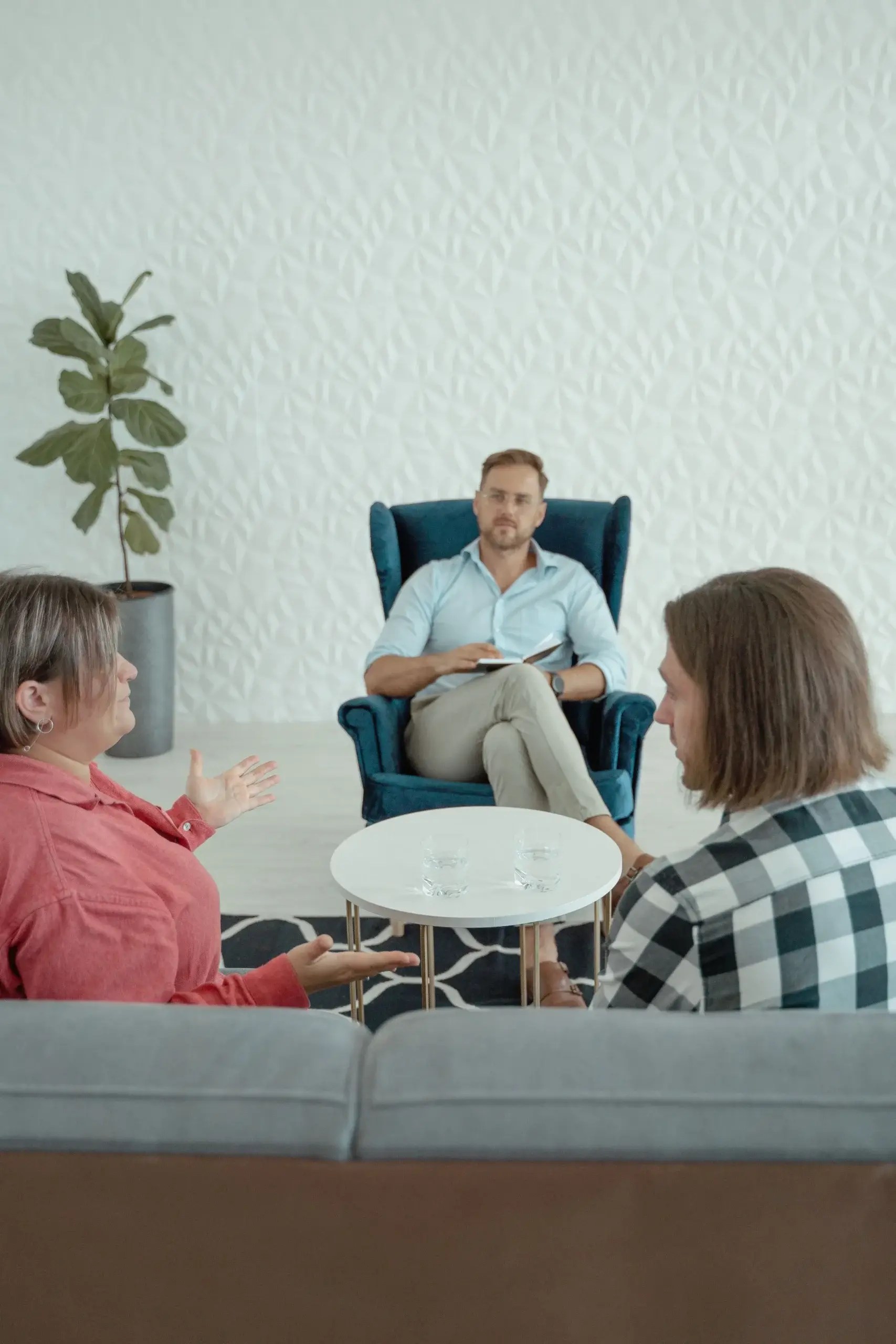 Therapist working with a couple during a counseling session